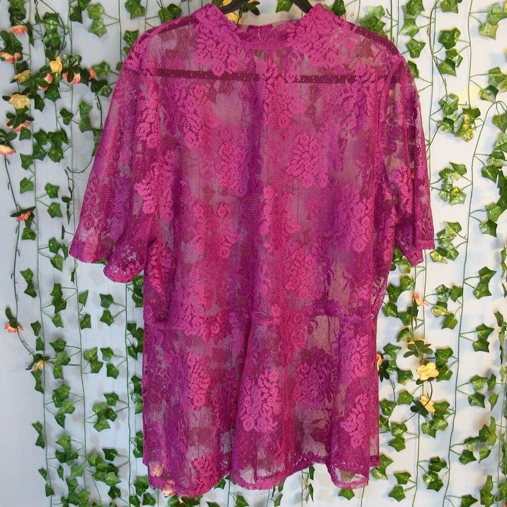 Purple lace blouse with floral pattern, size 14